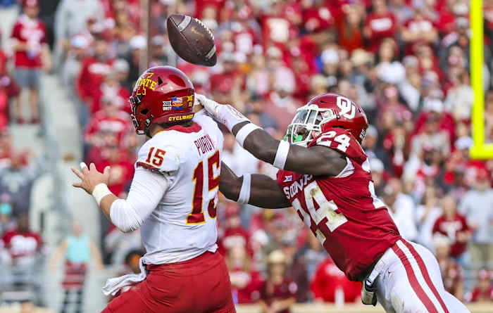 Oklahoma linebacker Brian Asamoah (24) causes Iowa State quarterback Brock Purdy (15) to fumble. Mandatory Credit: Kevin Jairaj-USA TODAY